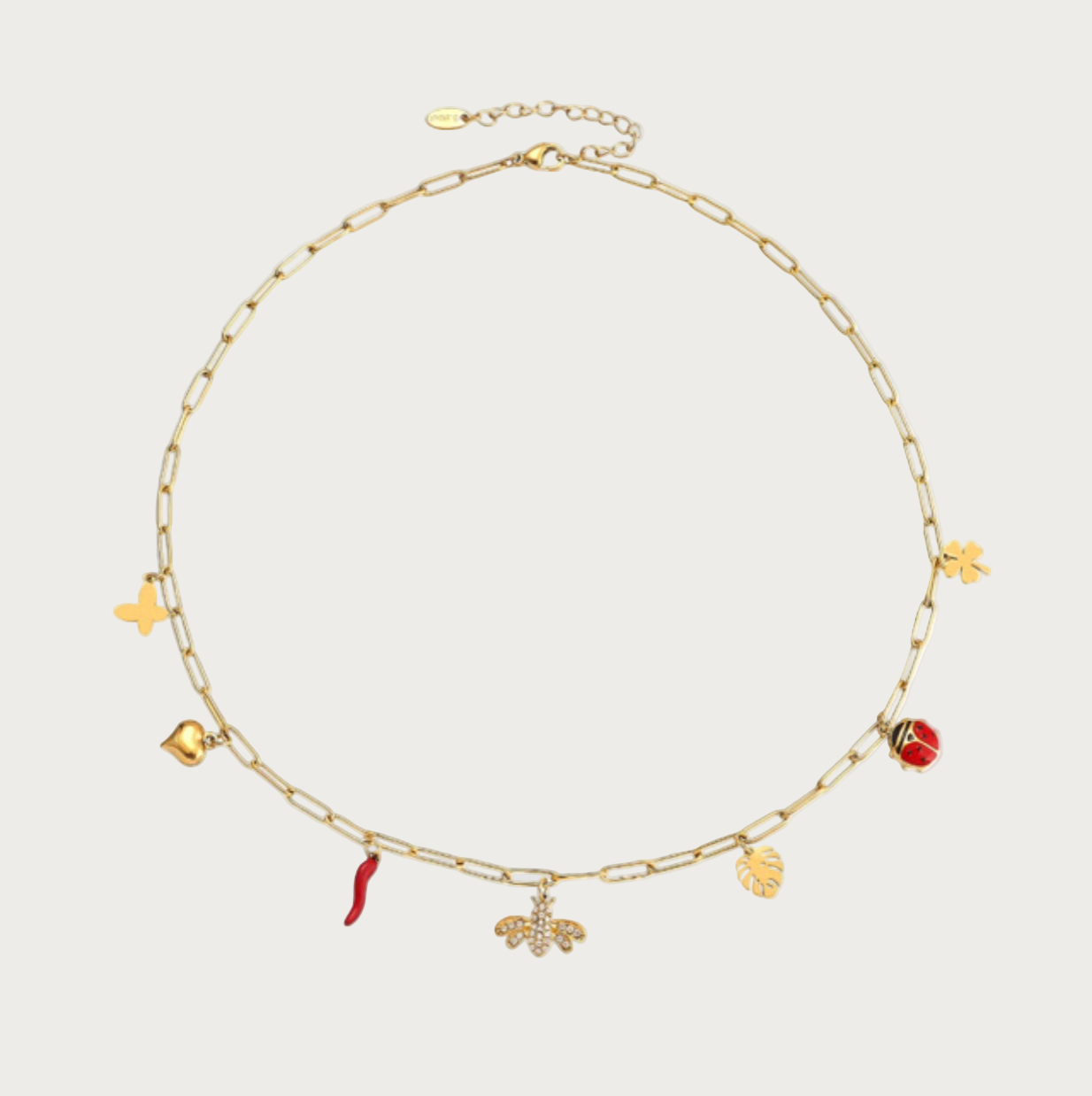 Collier Talismane doré pour femme en acier inoxydable, chaîne à maillons avec charms porte-bonheur, bijou waterproof Soreli Paris.
